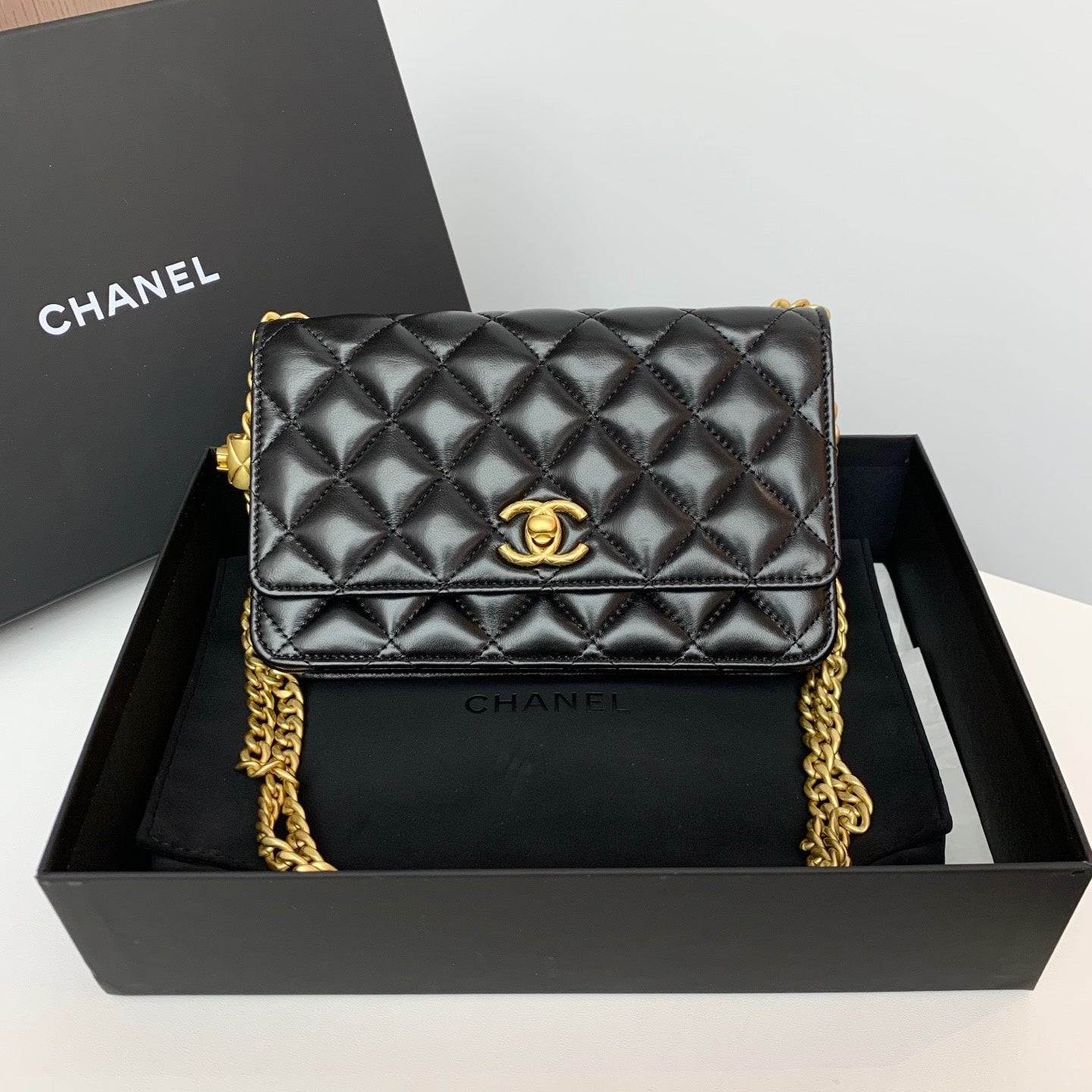 Chanel WOC Chain Bag with Gold Column Detail